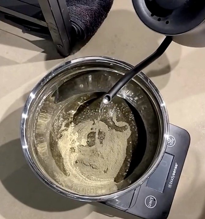 Plant hair colour being mixed with warm water