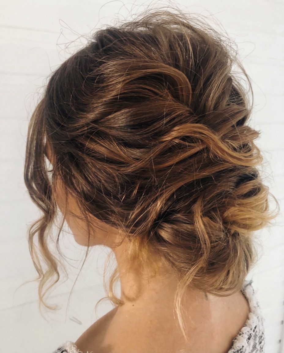 Loose bun with wavy strands